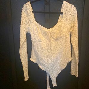 Floral lace bodysuit with snap button closure